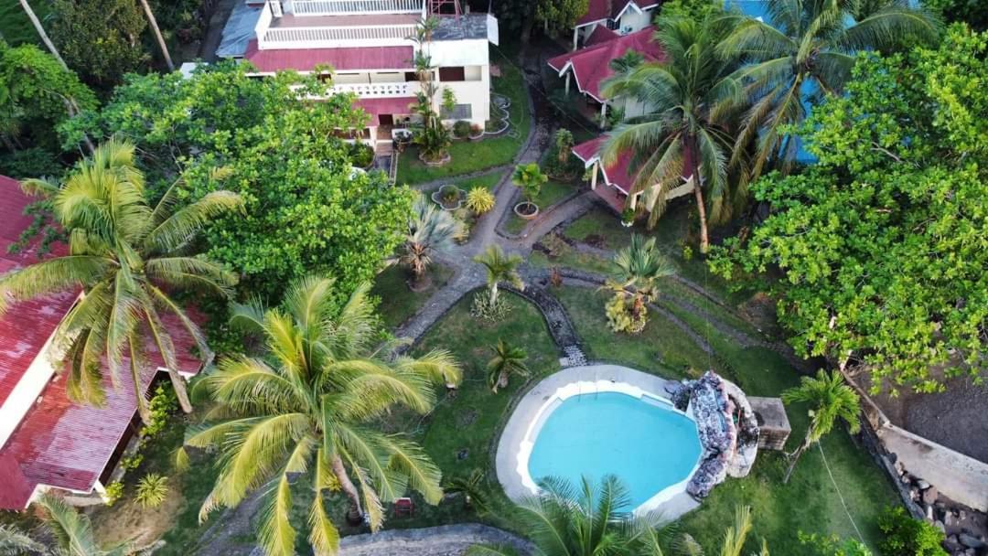 Puesta Del Sol Beach Bungalows And Restobar Mambajao Exterior photo